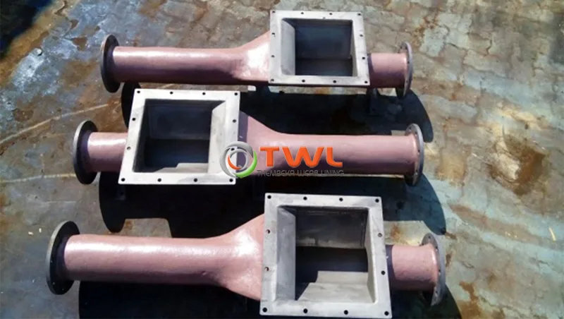 Three fabricated and internally lined industrial pipe sections