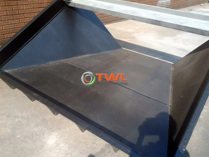 Industrial chute completed with an internal black rubber lining